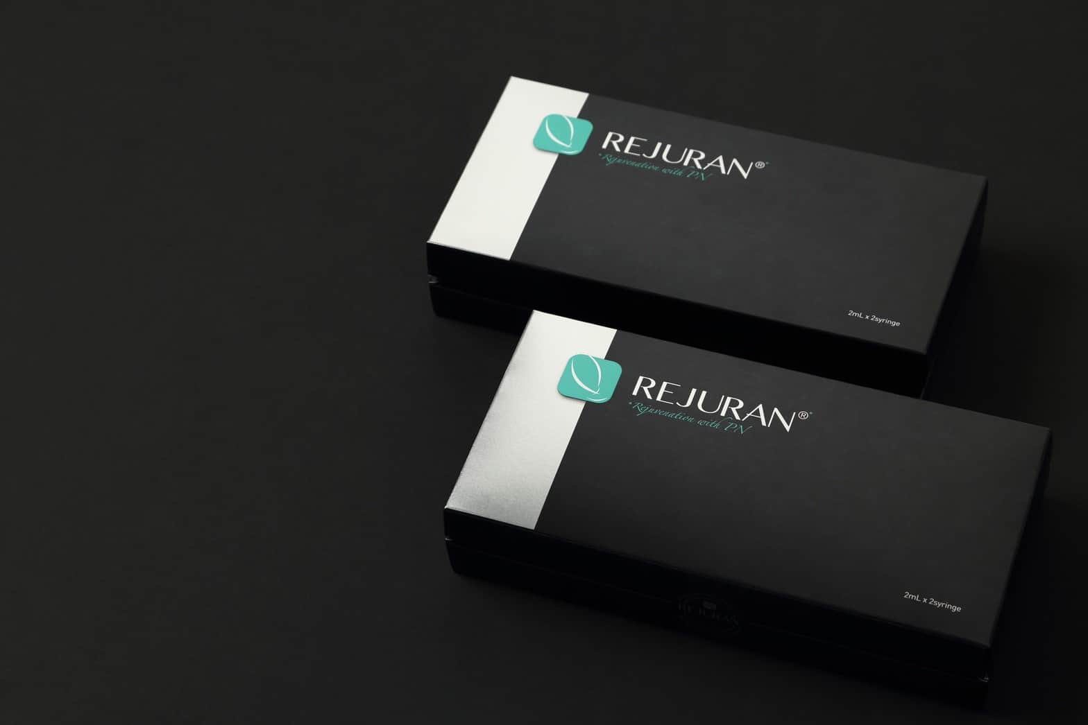 Two boxes of Rejuran on a black background.
